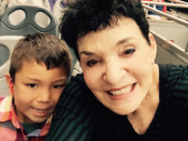 Picture of Dr. Linda Algazi with seven-year-old grandson.